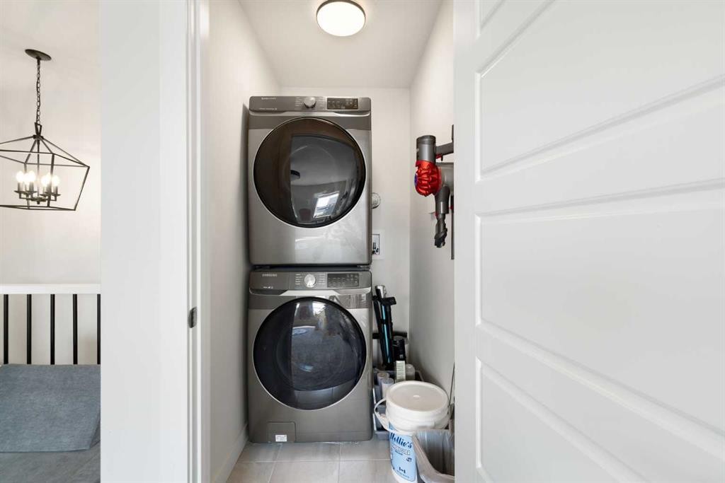 4 Mill Road, Cochrane, AB - Indoor Photo Showing Laundry Room