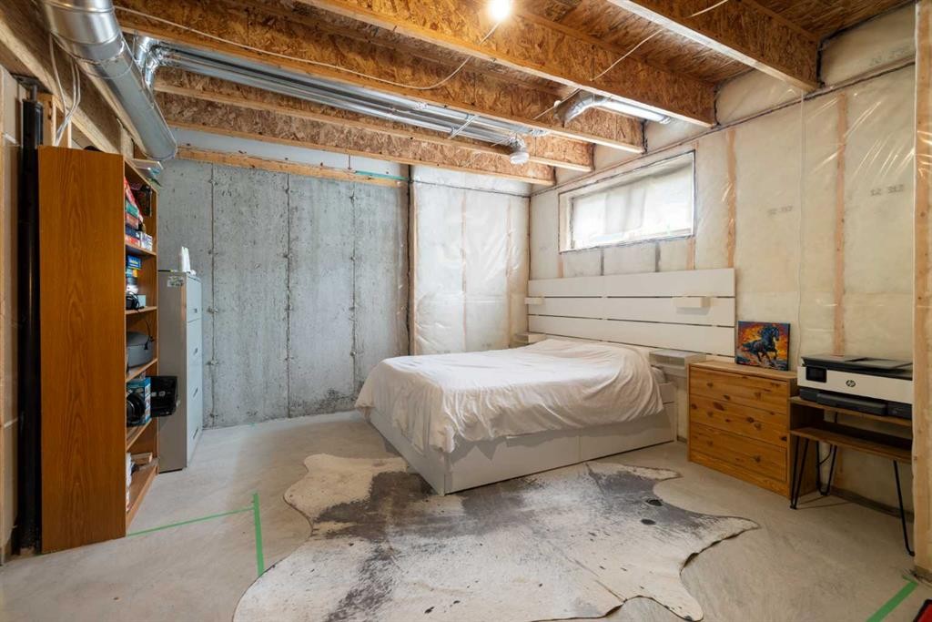4 Mill Road, Cochrane, AB - Indoor Photo Showing Basement