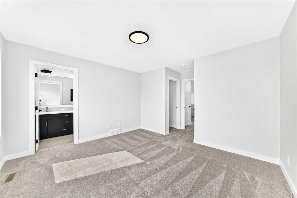 186 Lanark Gate Se, Airdrie, AB - Indoor Photo Showing Other Room