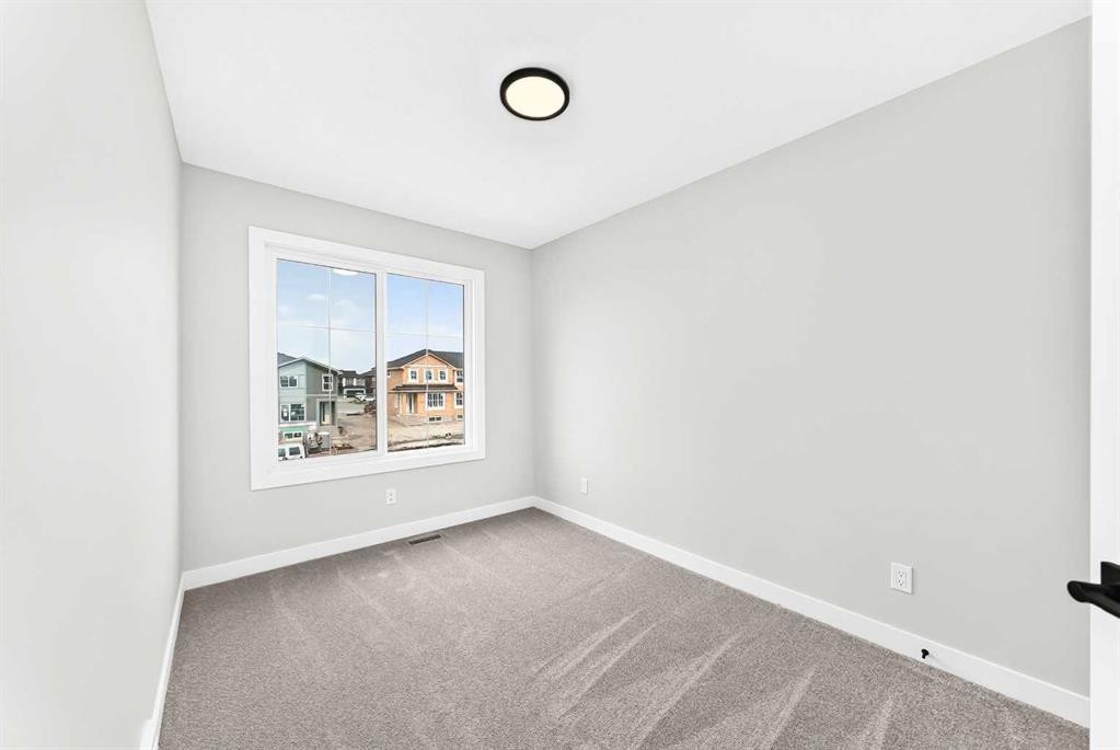 186 Lanark Gate Se, Airdrie, AB - Indoor Photo Showing Other Room