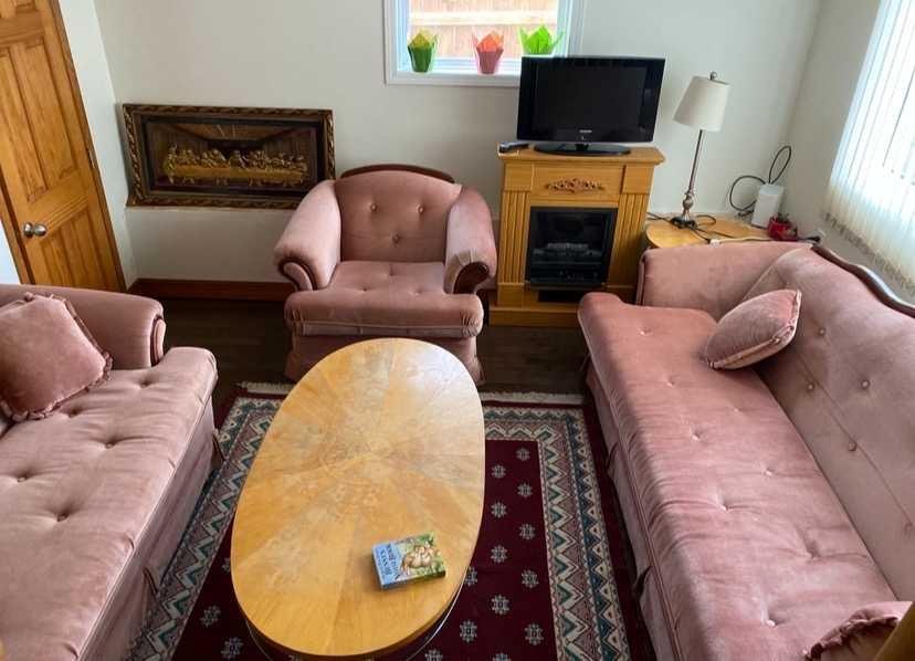 5123 19 Avenue Nw, Calgary, AB - Indoor Photo Showing Living Room With Fireplace