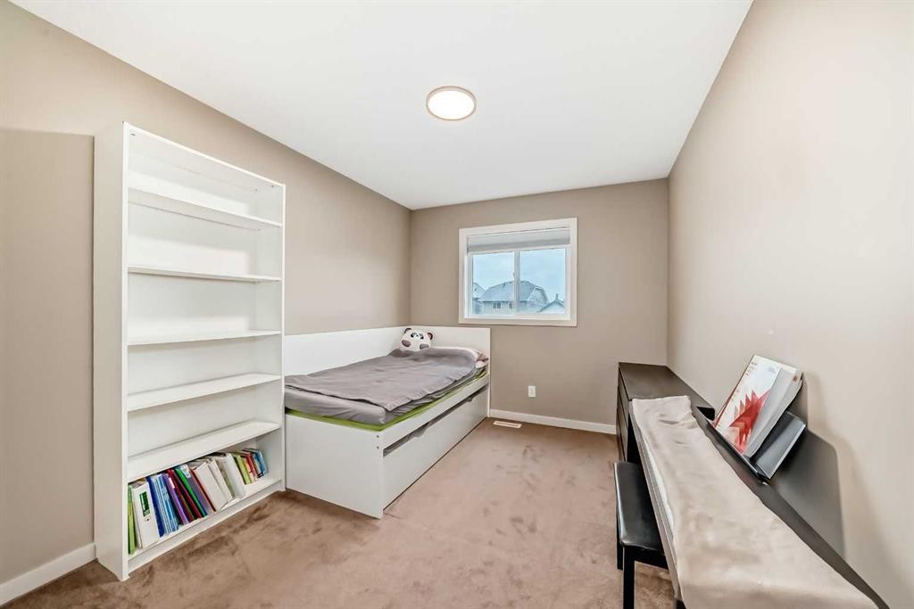 109 New Brighton Park Se, Calgary, AB - Indoor Photo Showing Bedroom