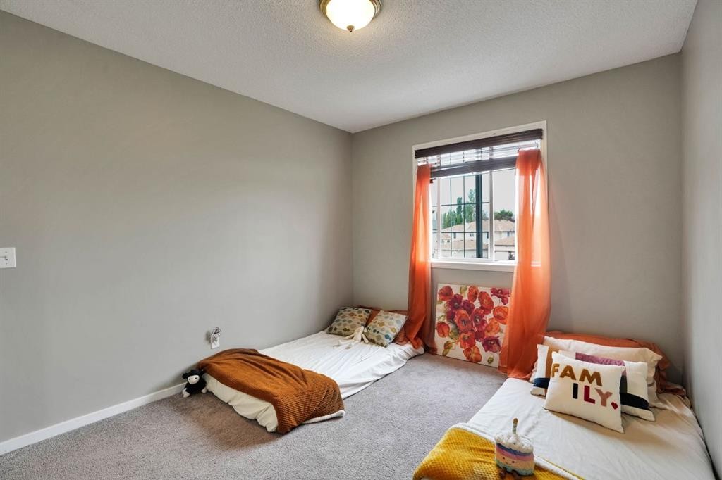 418 Long Beach Landing, Chestermere, AB - Indoor Photo Showing Bedroom