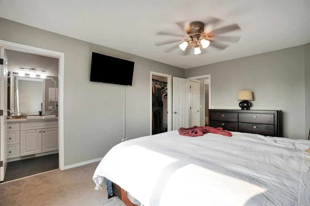 418 Long Beach Landing, Chestermere, AB - Indoor Photo Showing Bedroom