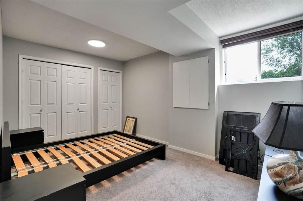 418 Long Beach Landing, Chestermere, AB - Indoor Photo Showing Bedroom