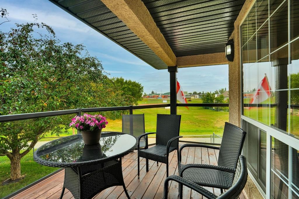 418 Long Beach Landing, Chestermere, AB - Outdoor With Deck Patio Veranda With Exterior