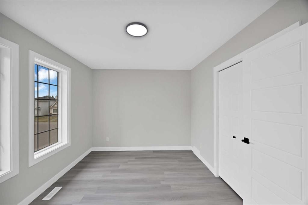 68 Laguna Close Ne, Calgary, AB - Indoor Photo Showing Other Room