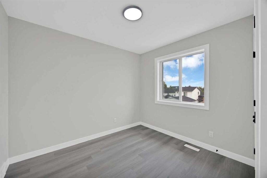 68 Laguna Close Ne, Calgary, AB - Indoor Photo Showing Other Room