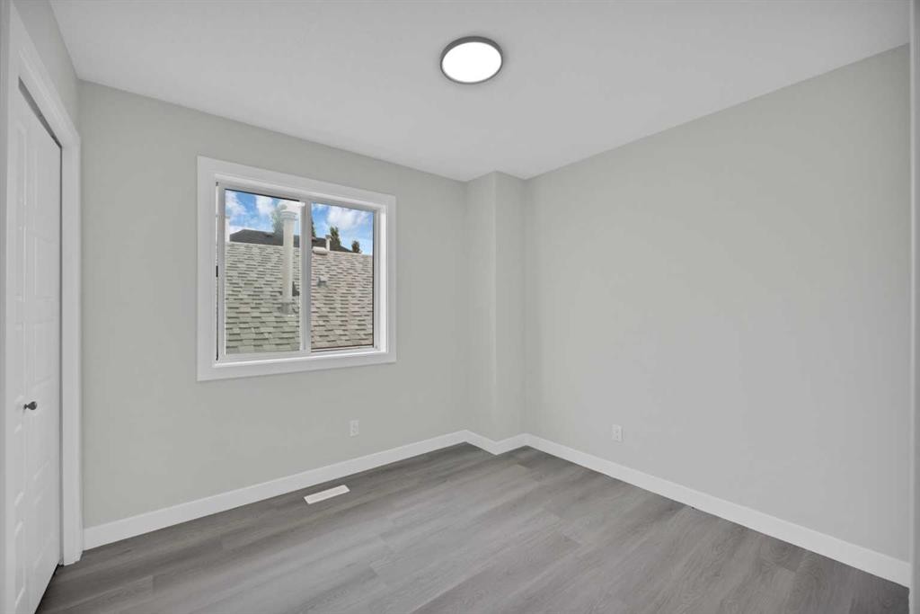 68 Laguna Close Ne, Calgary, AB - Indoor Photo Showing Other Room