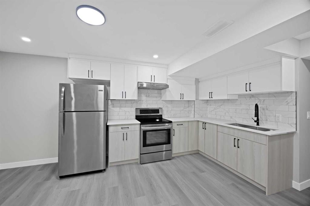 68 Laguna Close Ne, Calgary, AB - Indoor Photo Showing Kitchen With Stainless Steel Kitchen