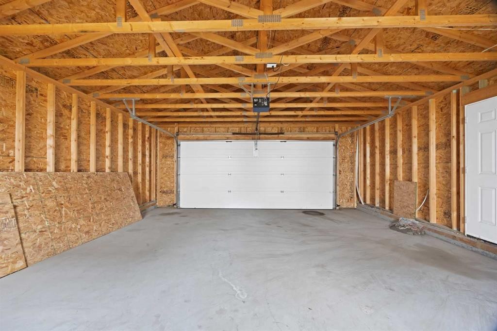 68 Laguna Close Ne, Calgary, AB - Indoor Photo Showing Garage