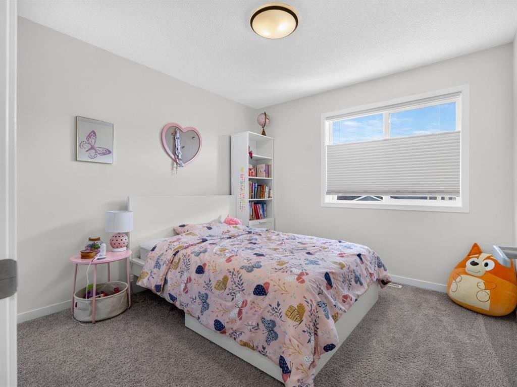 228 Masters Crescent Se, Calgary, AB - Indoor Photo Showing Bedroom