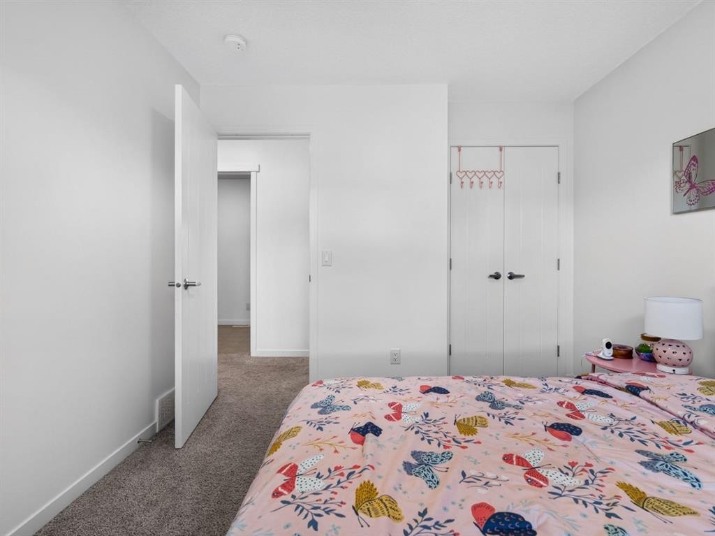 228 Masters Crescent Se, Calgary, AB - Indoor Photo Showing Bedroom