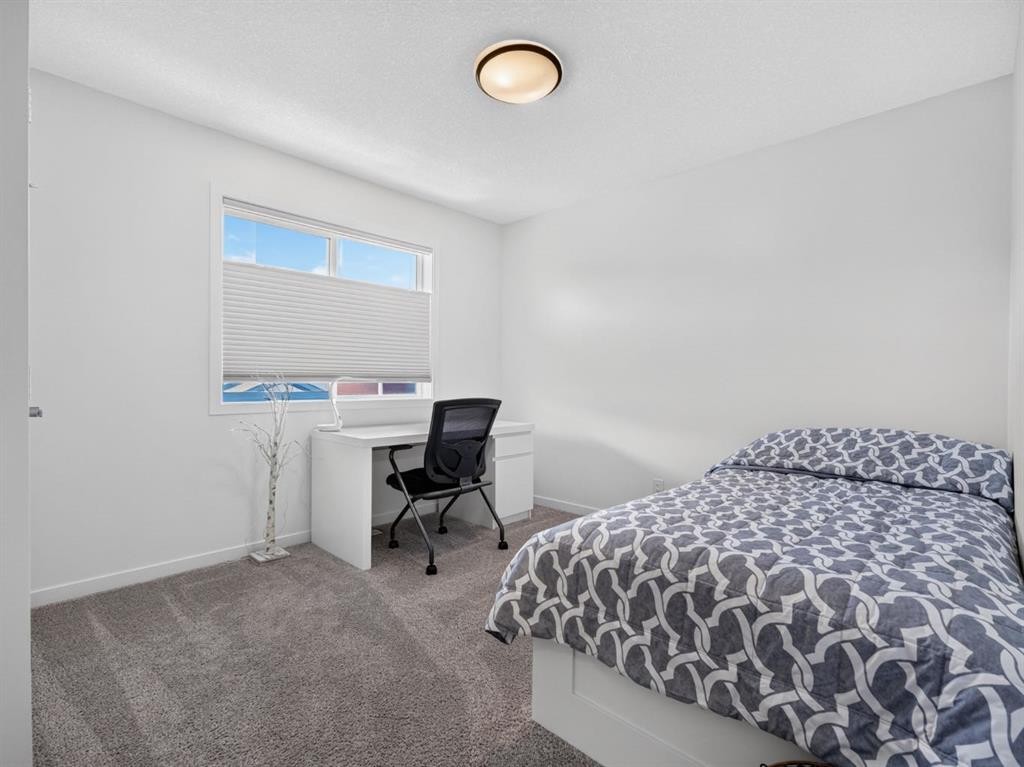 228 Masters Crescent Se, Calgary, AB - Indoor Photo Showing Bedroom