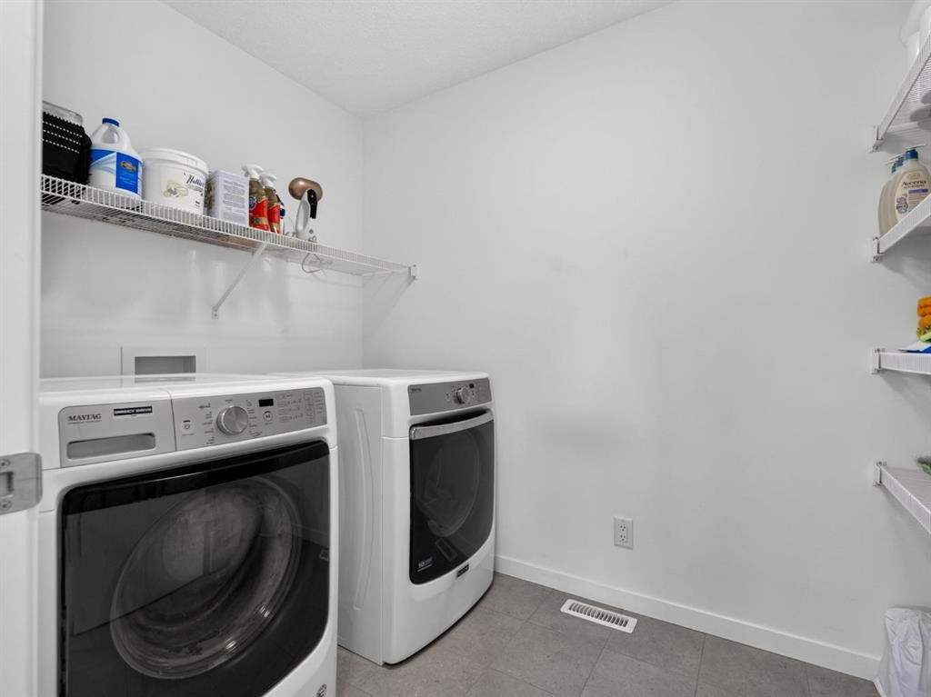 228 Masters Crescent Se, Calgary, AB - Indoor Photo Showing Laundry Room