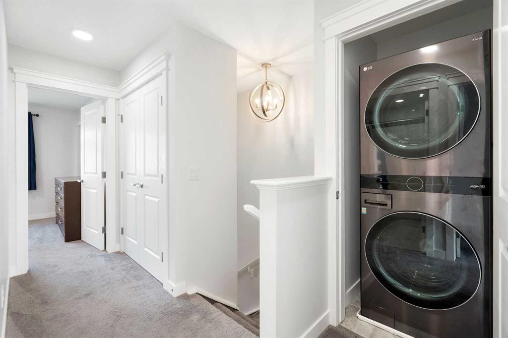 37 Verity Manor Sw, Calgary, AB - Indoor Photo Showing Laundry Room
