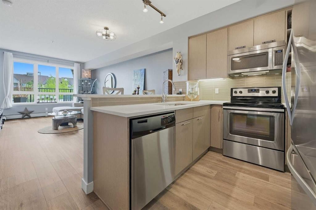 1106-175 Silverado Boulevard Sw, Calgary, AB - Indoor Photo Showing Kitchen
