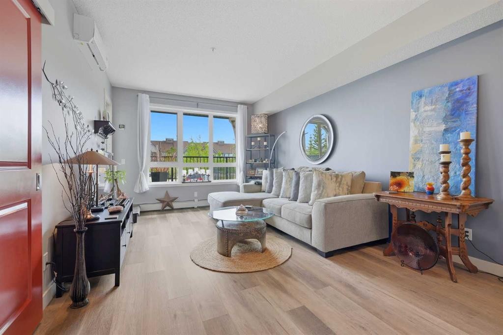 1106-175 Silverado Boulevard Sw, Calgary, AB - Indoor Photo Showing Living Room