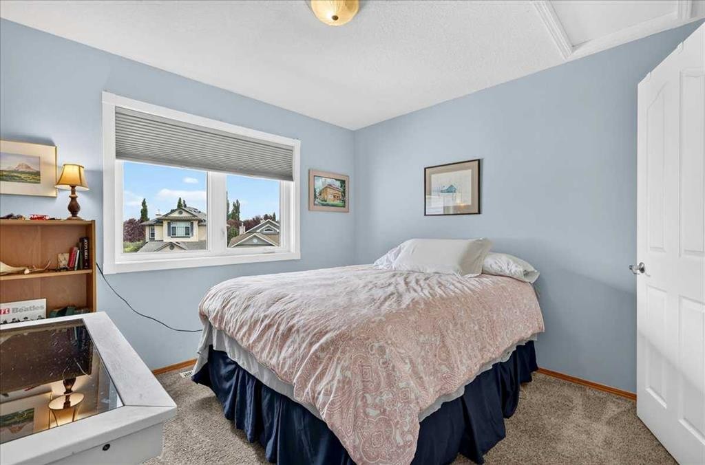 23 Cranfield Crescent Se, Calgary, AB - Indoor Photo Showing Bedroom