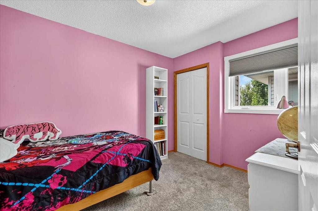 23 Cranfield Crescent Se, Calgary, AB - Indoor Photo Showing Bedroom