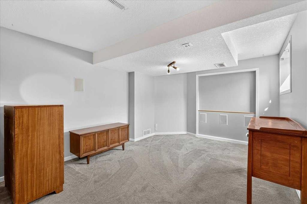 23 Cranfield Crescent Se, Calgary, AB - Indoor Photo Showing Other Room