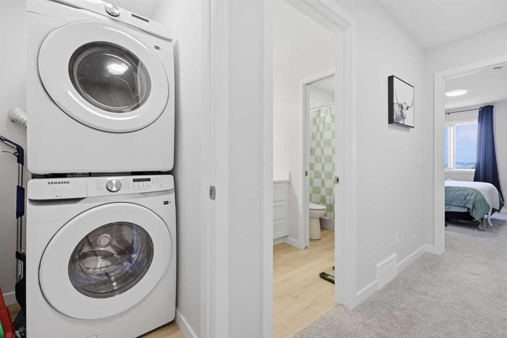 11 Park Lane, Didsbury, AB - Indoor Photo Showing Laundry Room