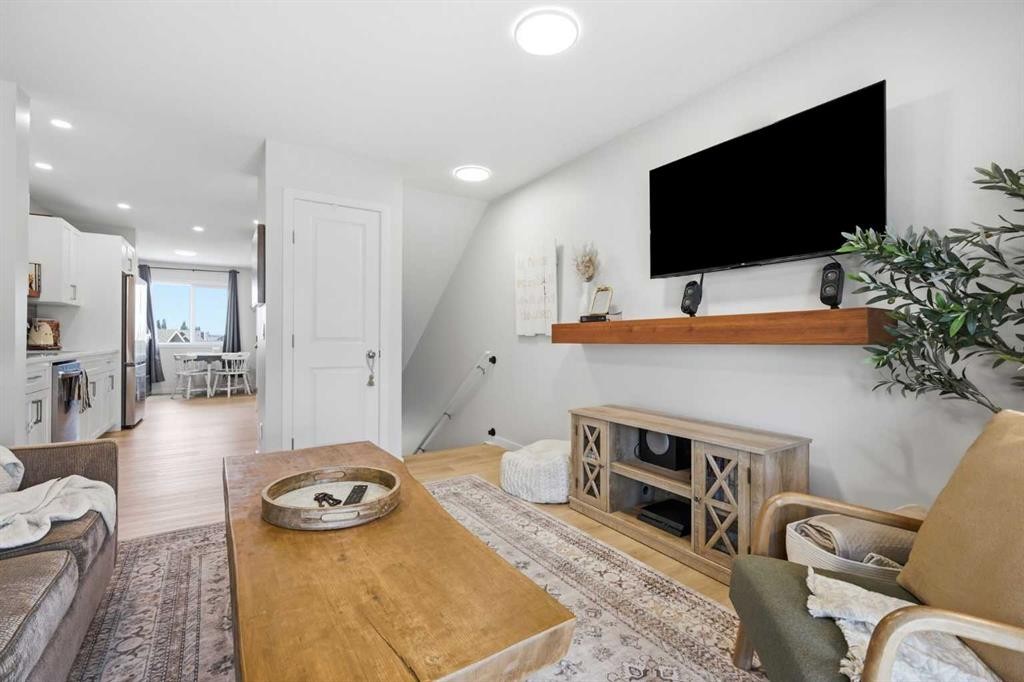 11 Park Lane, Didsbury, AB - Indoor Photo Showing Living Room With Fireplace