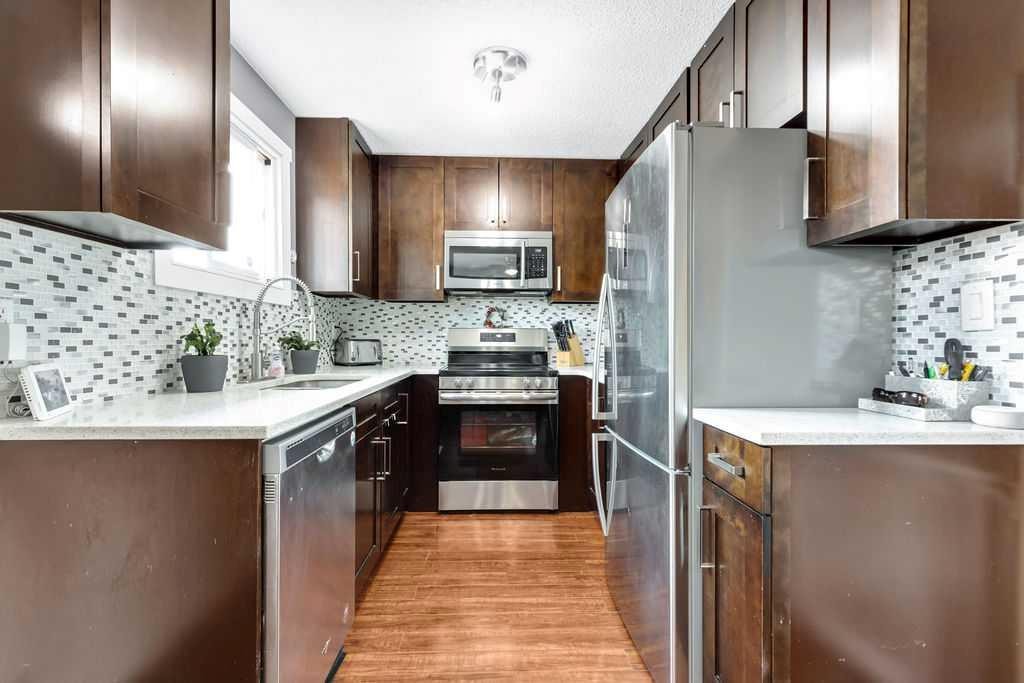 44 Falwood Crescent Ne, Calgary, AB - Indoor Photo Showing Kitchen With Upgraded Kitchen