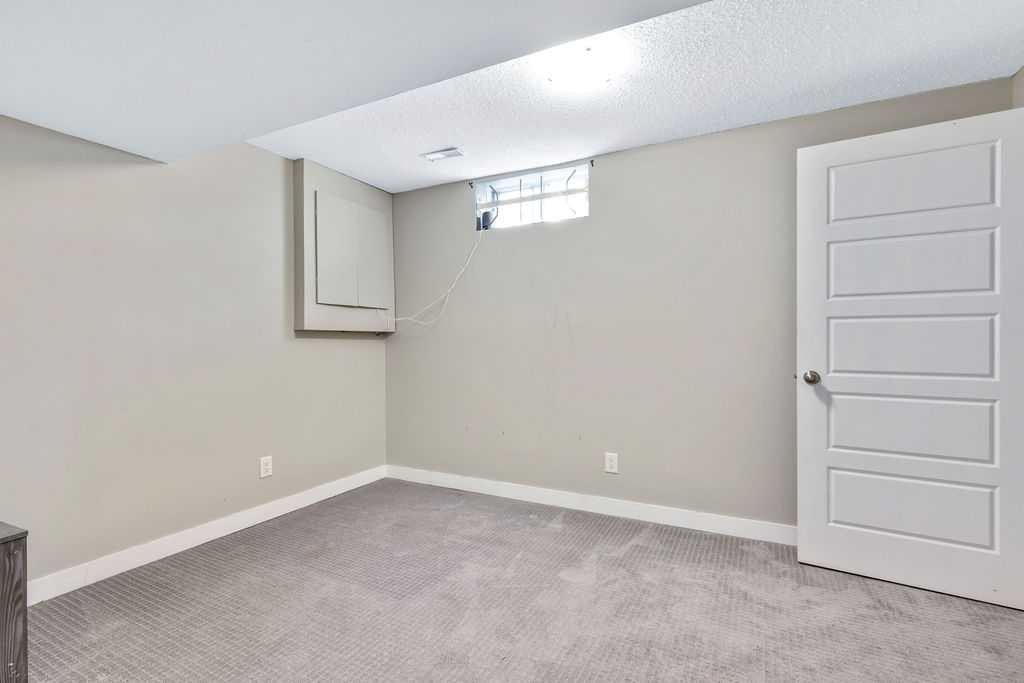 44 Falwood Crescent Ne, Calgary, AB - Indoor Photo Showing Other Room