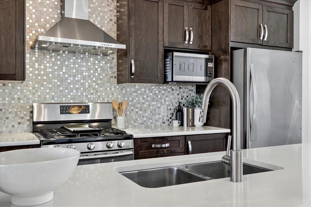 24 Auburn Meadows Green Se, Calgary, AB - Indoor Photo Showing Kitchen With Stainless Steel Kitchen With Double Sink With Upgraded Kitchen