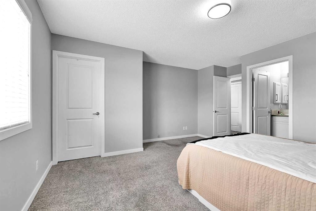 75 Evanscrest Way Nw, Calgary, AB - Indoor Photo Showing Bedroom