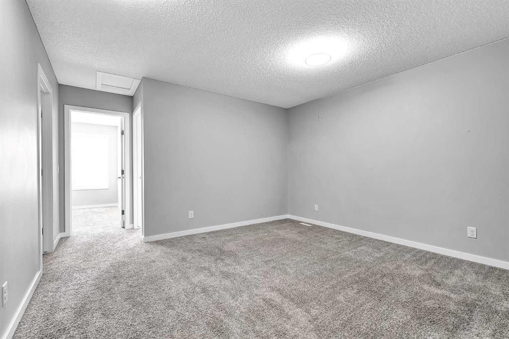 75 Evanscrest Way Nw, Calgary, AB - Indoor Photo Showing Other Room