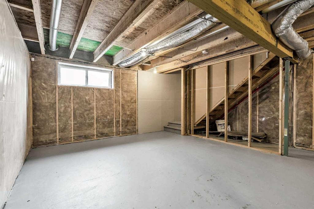 75 Evanscrest Way Nw, Calgary, AB - Indoor Photo Showing Basement