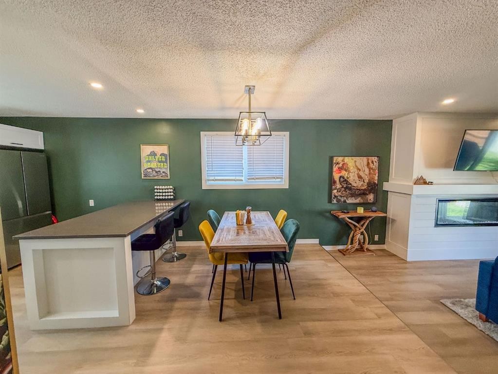 119 Fallswater Crescent Ne, Calgary, AB - Indoor With Fireplace