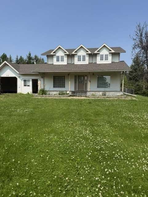 192 Range Road Range North, Grassland, AB - Outdoor With Deck Patio Veranda With Facade