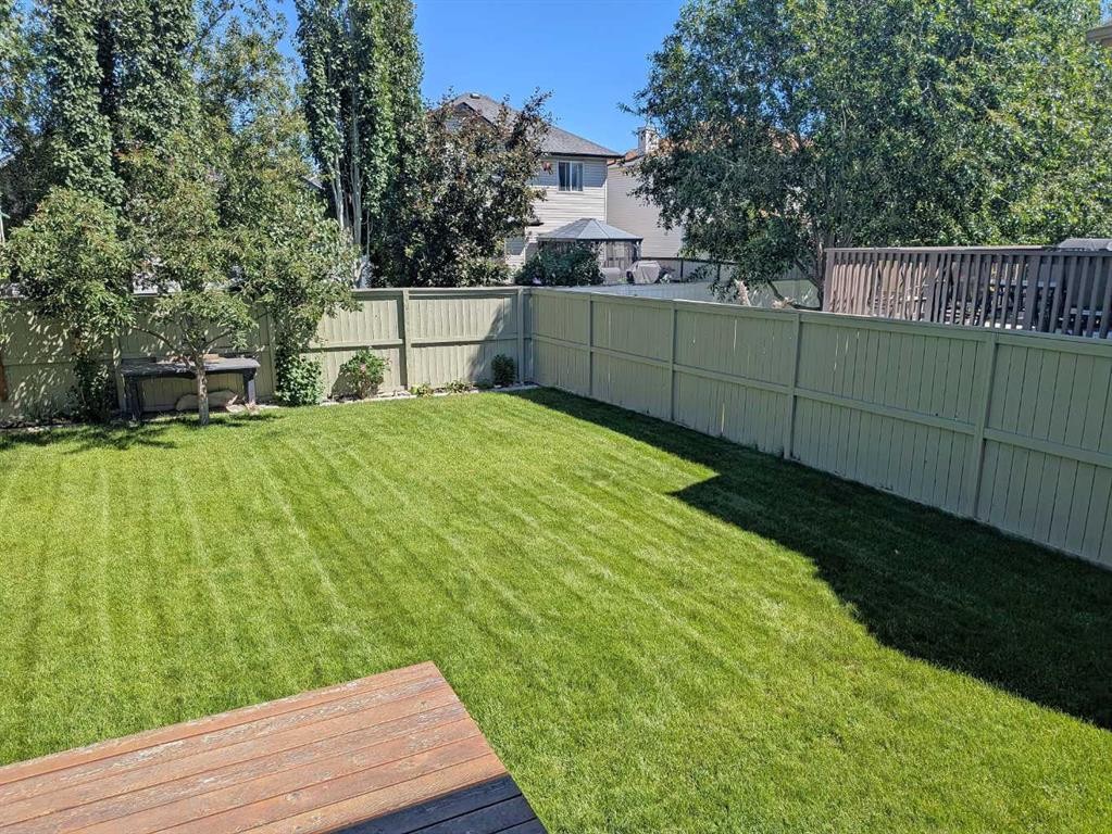 34 Coopers Close Sw, Airdrie, AB - Outdoor With Deck Patio Veranda