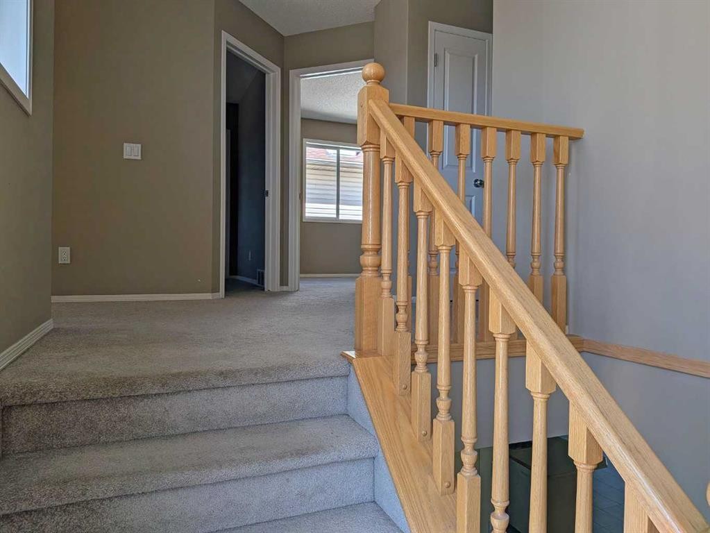 34 Coopers Close Sw, Airdrie, AB - Indoor Photo Showing Other Room