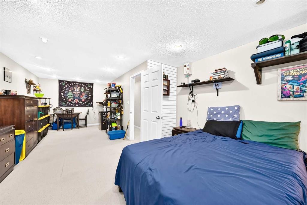 256 Midvalley Place Se, Calgary, AB - Indoor Photo Showing Bedroom