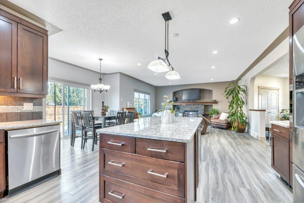101 Hawkmere Place, Chestermere, AB - Indoor Photo Showing Kitchen With Upgraded Kitchen