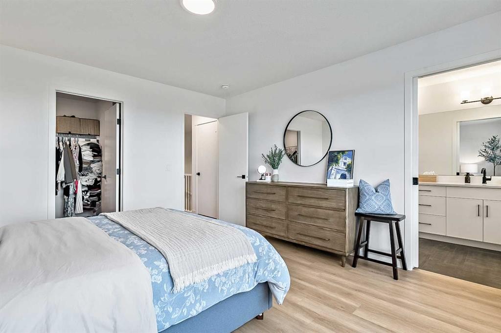 99 Masters Road Se, Calgary, AB - Indoor Photo Showing Bedroom