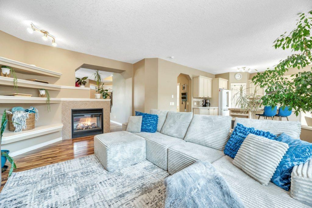 243 Westchester Boulevard, Chestermere, AB - Indoor Photo Showing Living Room With Fireplace