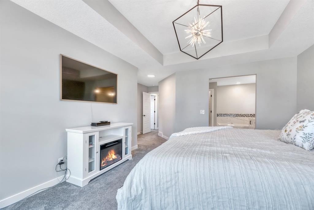 303 Dawson Harbour Court, Chestermere, AB - Indoor Photo Showing Bedroom