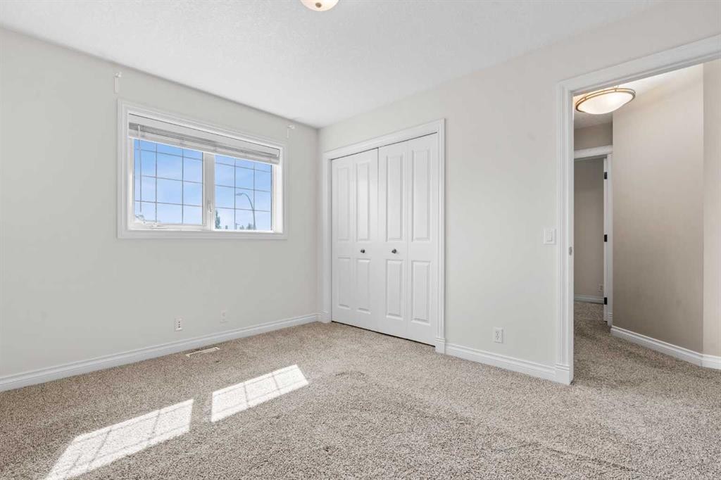 92 Cranston Drive Se, Calgary, AB - Indoor Photo Showing Other Room