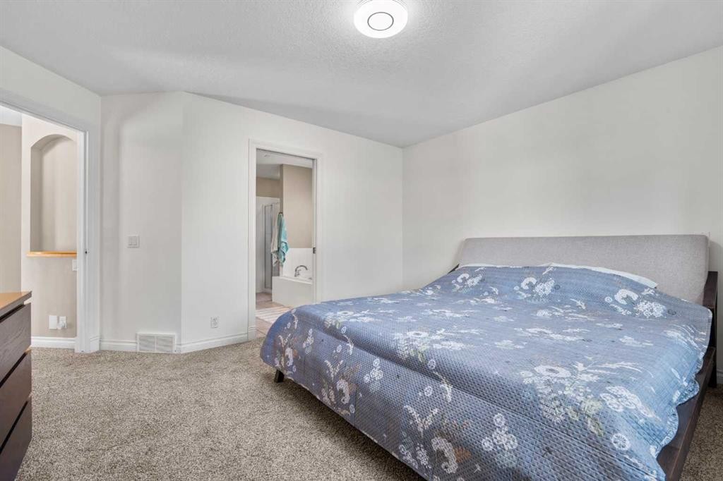 92 Cranston Drive Se, Calgary, AB - Indoor Photo Showing Bedroom