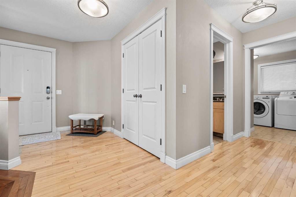 92 Cranston Drive Se, Calgary, AB - Indoor Photo Showing Laundry Room