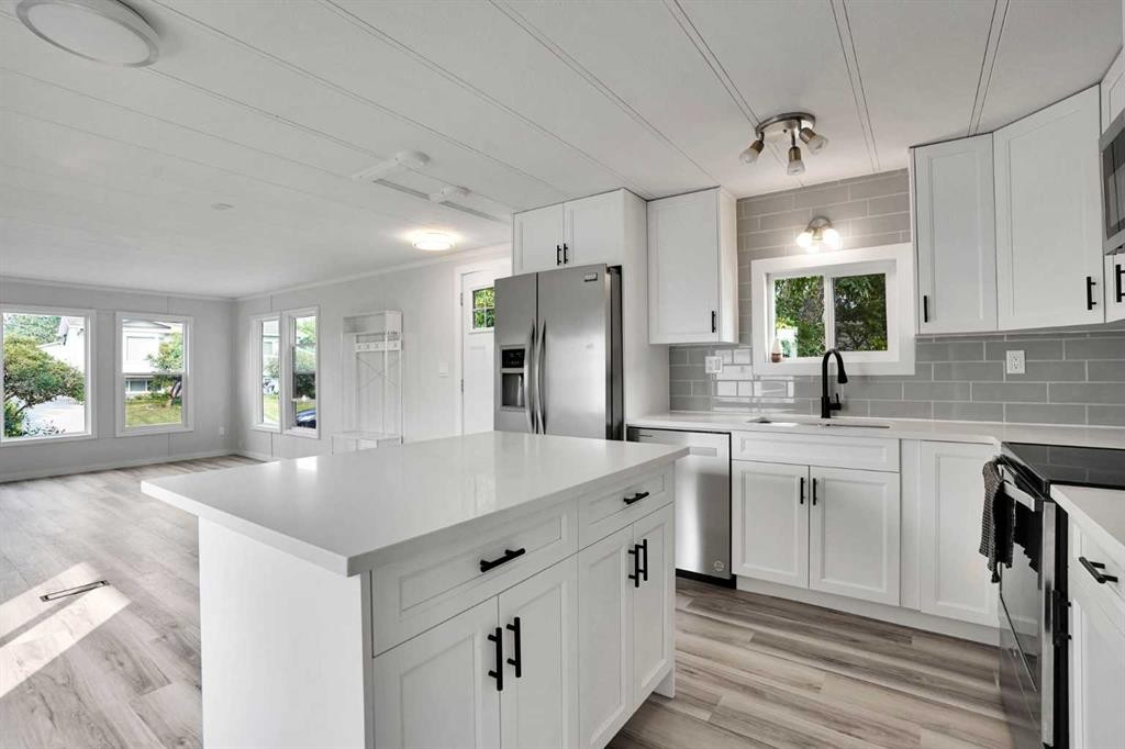 64 Huntwell Way Ne, Calgary, AB - Indoor Photo Showing Kitchen With Upgraded Kitchen