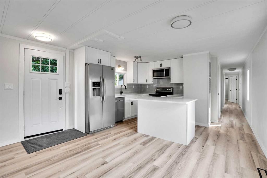 64 Huntwell Way Ne, Calgary, AB - Indoor Photo Showing Kitchen