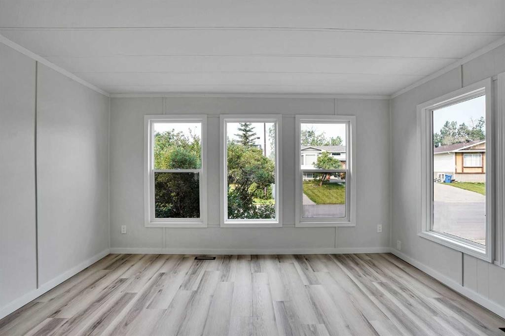 64 Huntwell Way Ne, Calgary, AB - Indoor Photo Showing Other Room