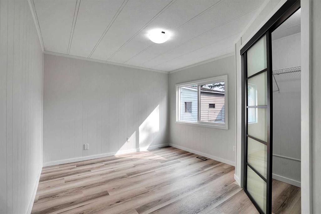 64 Huntwell Way Ne, Calgary, AB - Indoor Photo Showing Other Room