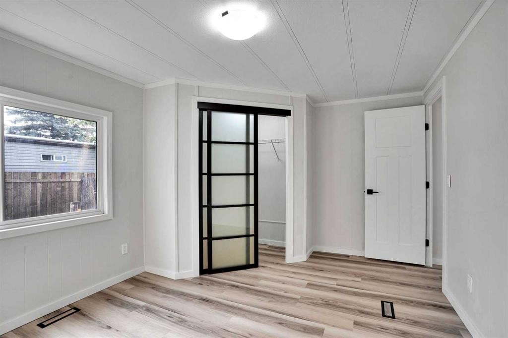 64 Huntwell Way Ne, Calgary, AB - Indoor Photo Showing Other Room